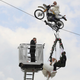 Illustration for article titled Saturday Night Social: Congrats to This Couple Who Wedded on a Swing Hanging from a Motorcycle on a Tightrope!